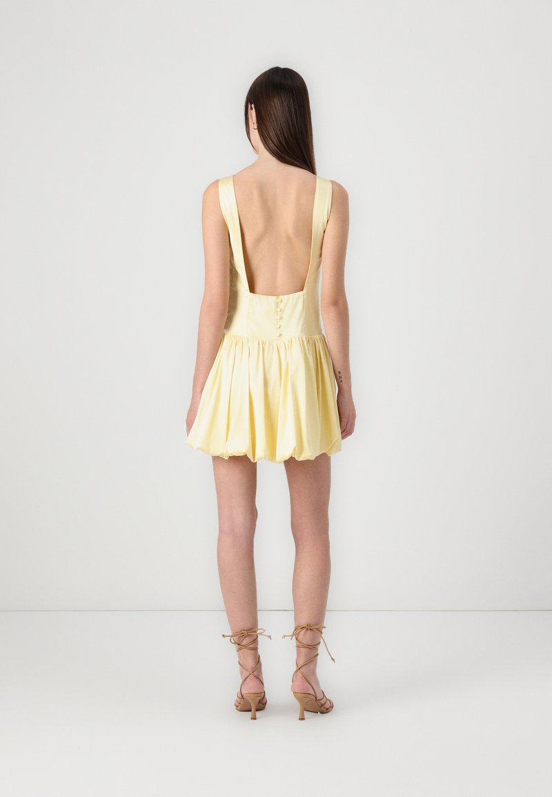 abercrombie and fitch yellow dress & White Floral Smocked Bodice Front Slit Dres  The Saved Collection back detail and an adjustable halter tie Abercrombie & Fitch plunge cowl
