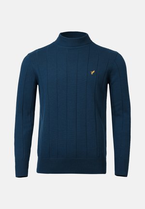 Suéter de cuello alto acanalado en color navy, hecho de algodón suave, con rayas verticales y un pequeño logo dorado en el lado izquierdo del pecho. Ideal para superponer.