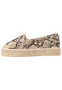 Beige espadrille slip-on with a textured snake print upper, jute rope sole, and sturdy stitching along the edge. Round toe design.