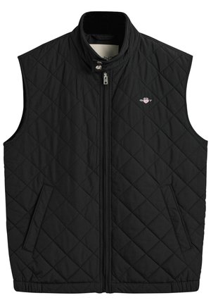 Zwarte gewatteerde vest met hoge kraag, ritsluiting aan de voorkant, twee zijzakken en een klein logo op de borst. Gladde textuur.