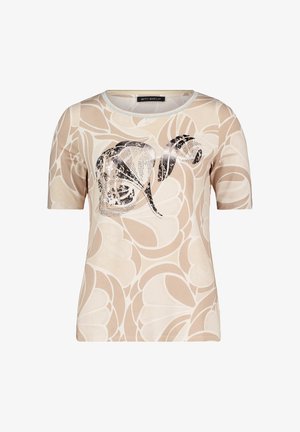Beige t-shirt met korte mouwen, voorzien van een zwart en zilver abstract patroon aan de voorkant, gemaakt van een zachte stof en met een ronde hals.