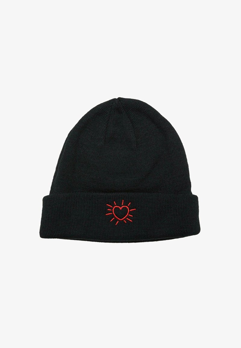Black knitted beanie with a turned-up cuff featuring a red embroidered heart with rays. Soft texture and close-knit design.