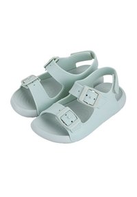 Light blue sandals made of synthetic material with two adjustable buckles, open heel, and textured, ridged footbed.