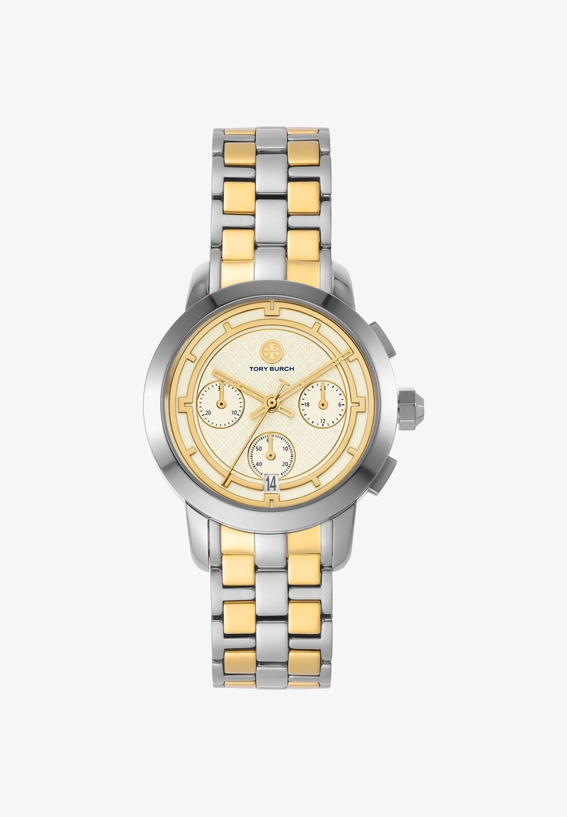 Reloj pulsera de metal bicolor plata y oro con esfera crema con acentos dorados, tres subesferas, ventana de fecha y logo de Tory Burch a las 12 en punto.