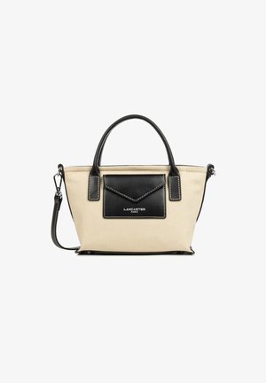 Sac fourre-tout en toile beige avec des accents en cuir noir, poignées supérieures et une poche avant. Présente des coutures contrastées et une bandoulière amovible.