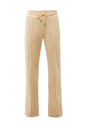 Beige, weite Hose aus weichem Stoff. Mit elastischem Bund und Kordelzug, seitlichen Nähten und einer glatten Textur. Geeignet für die Freizeit.