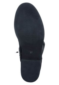 Svart ankelboot med en slät gummisula, texturerad ovandel, dragkedjestängning på sidan och storleksmarkering "37" på undersidan.