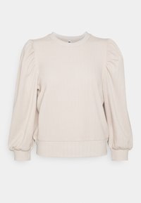 Světle béžový pulovrový svetr s texturovanou látkou, kulatým výstřihem a nafouknutými rukávy s přiléhavými manžetami.