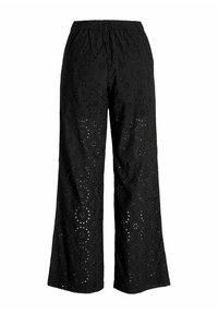 Pantalons larges noirs en tissu texturé avec broderies en œillets à motifs floraux et un design respirant. Taille élastique.