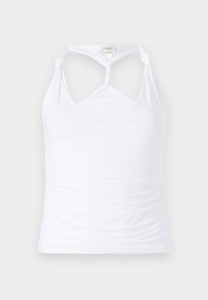 White sleeveless top with a knotted design at the neck, featuring gathered texture along the sides. Made from stretchy material.