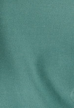 Tessuto a costine turchese con una texture liscia, caratterizzato da un motivo uniforme di linee verticali e una leggera elasticità.