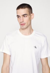 Calvin Klein Jeans MONOLOGO 2 PACK - Camiseta básica -  black/bright white