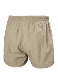 Bañador beige hecho de tejido ligero, con cinturilla elástica y un corte relajado. Textura suave con un diseño liso.