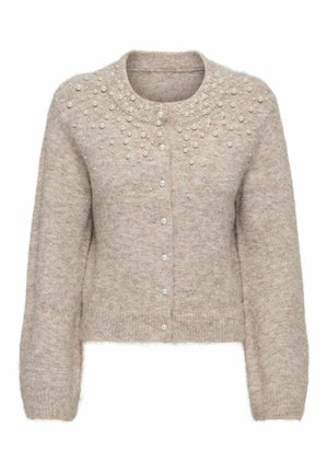 Beige cardigan laget av mykt materiale, med rund hals, perlepynt på skuldrene og knapper foran.