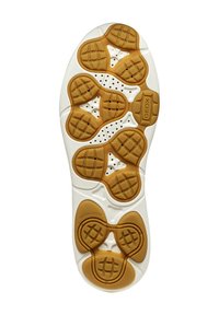Suela de zapato de goma blanca y beige con patrones de agarre texturizados, agujeros de aire y detalles de marca. Presenta múltiples formas curvas y ovaladas.