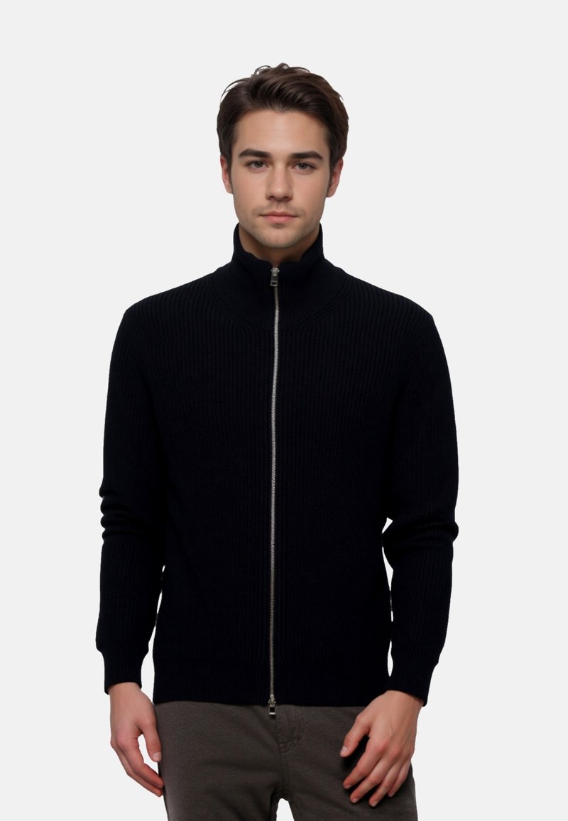 Black ribbed zip-up sweater with a high collar, fitted sleeves, and a smooth zipper; made from soft, textured material.