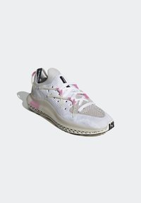 Lightweight athletic shoes feature a white mesh upper with pink accents, textured neutral sole, and translucent detailing at the heel.