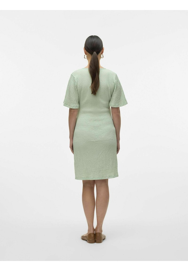green emerald velvet dress CAMEO MINI DRESS-APP/GREEN  SohoGirl.com