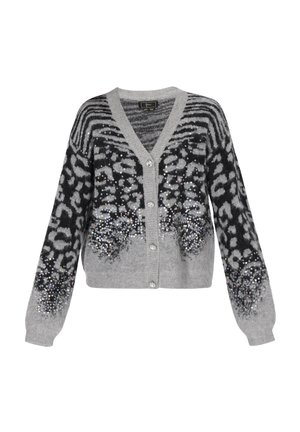 Harmaa neuletakki, jossa on V-pääntie, nappi etuosa ja musta eläinkuosilla, jossa on hopeansävyisiä paljettiyksityiskohtia hihoissa ja alahelmassa.