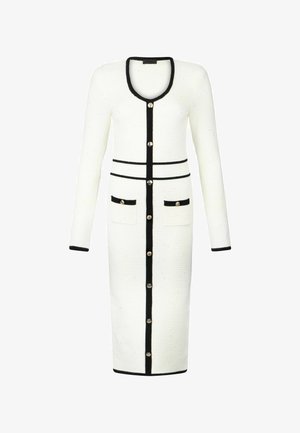 Sukienka dzianinowa w białym kolorze z czarnymi wykończeniami, okrągłym dekoltem, długimi rękawami i dwoma przednimi kieszeniami; zdobiona złotymi guzikami z przodu.
