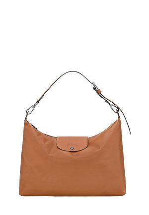 Brown leather shoulder bag with a single adjustable strap and a small flap with button closure on the front.