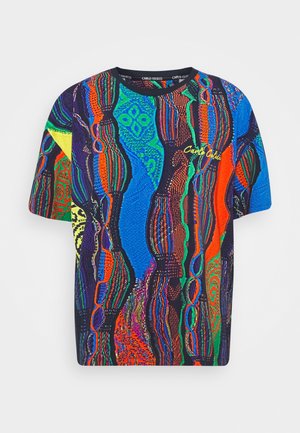 Short-sleeve knitted t-shirt with multicolored abstract patterns in blue, green, red, orange, and black, featuring small yellow "Carlo Colucci" text.