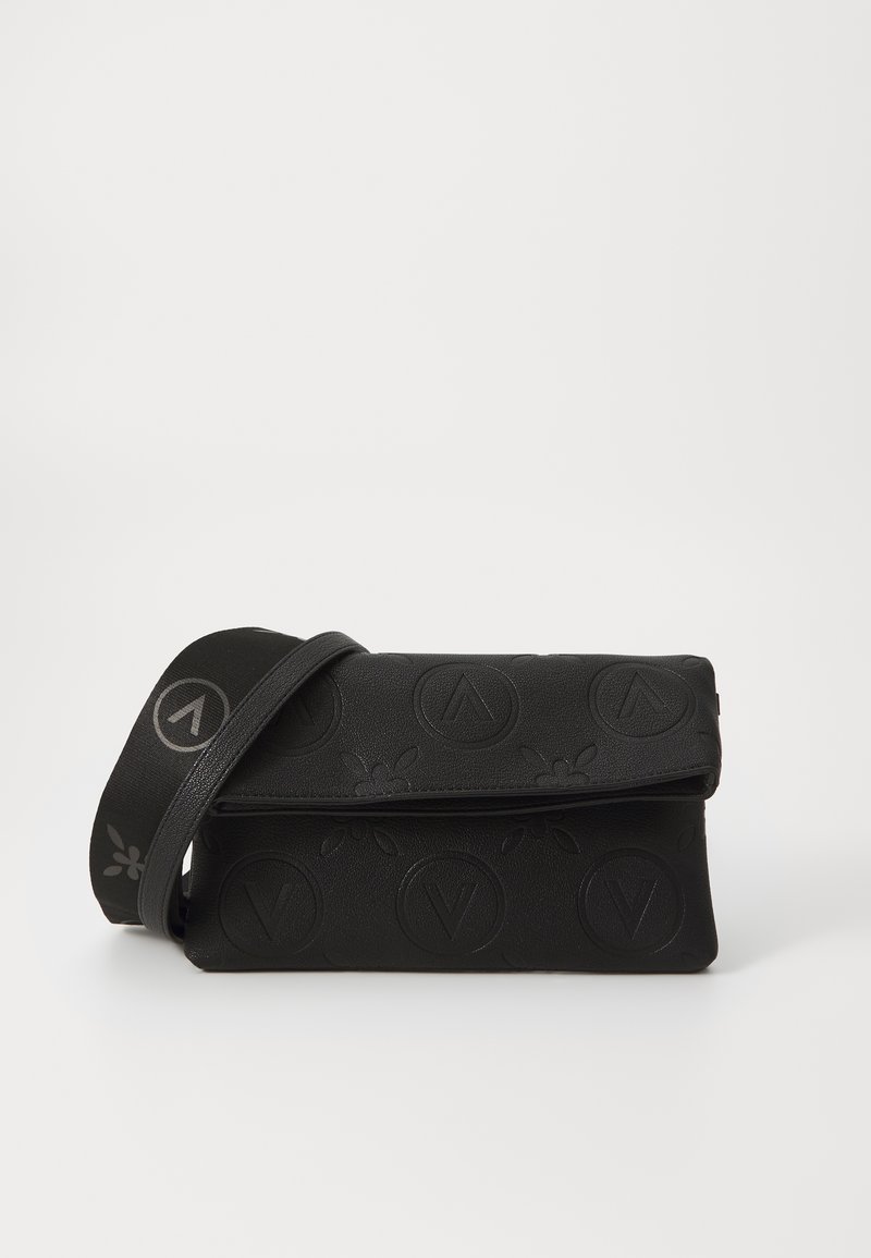 Black handbag with an embossed floral pattern and logo accents. Features a fold-over flap and a matching strap for crossbody wear.