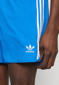 adidas Originals SPRINTER - Shorts - bluebird