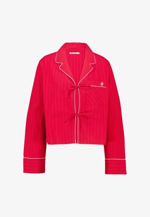 Haut de pyjama rouge court avec des rayures blanches, un col en V, des liens à l'avant et une poche sur la poitrine gauche avec un détail de logo brodé.