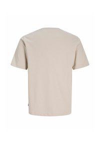 T-shirt beige à manches courtes et col rond, montré de dos sur fond blanc.