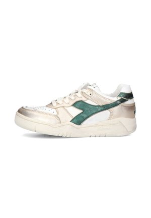 White and metallic gold sneaker with green accents, smooth and textured surfaces, perforated toe, padded tongue, and a rubber sole.