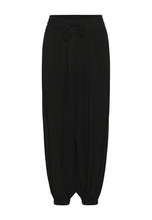 Lahtised mustad paelaga püksid, millel on elastne vöökoht ja mansetiga pahkluud, mõeldud igapäevaseks kandmiseks.