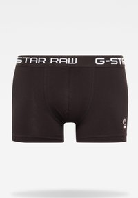 Boxer neri in cotone con una vita a logo "G-STAR RAW" bianco e cuciture a contrasto. Presentano una vestibilità aderente e un design con tasca frontale.