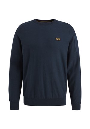 Marinblå tröja i mjukt stickat tyg, med rund halsringning, ribbade ärmslut och nederkant, samt en liten bröstlogo. 