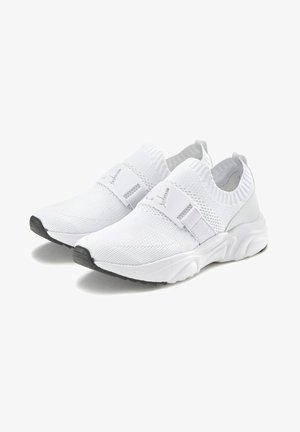 White stretch-knit sneakers with elastic strap closure, round toe, textured upper, and grey accents on the heel and sole.