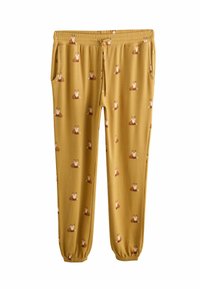 Pantaloni da jogging gialli realizzati in tessuto morbido, con un motivo a volpe ripetuto, dotati di una fascia elastica in vita e polsini affusolati.