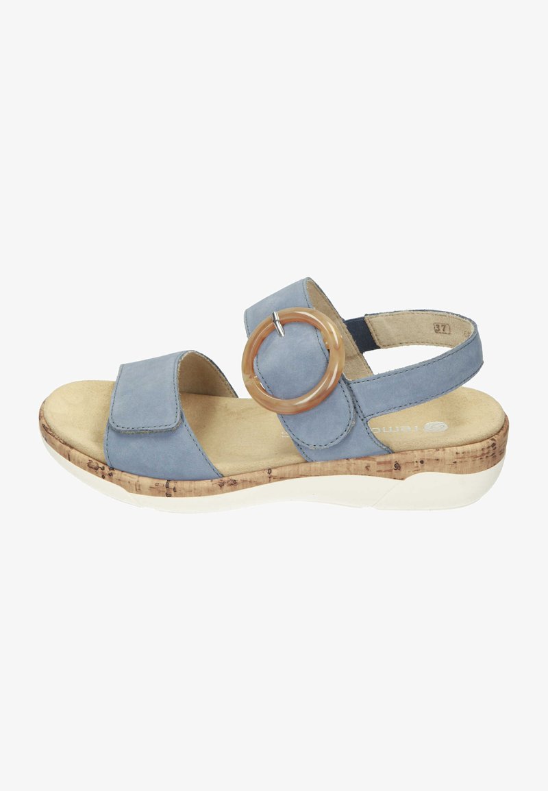 Blaue Ledersandale mit zwei breiten Riemen, einem runden Akzent und einer leichten Korkbasis. Verfügt über eine gepolsterte Innensohle und eine weiße Sohle.