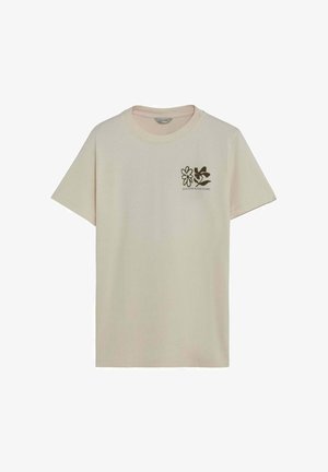 Tricou din bumbac cu mâneci scurte, de culoare crem, cu un model floral verde închis pe partea stângă a pieptului. De-colteu simplu, rotund.