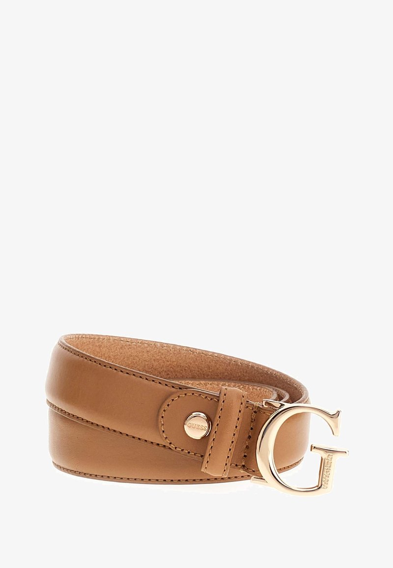 Kohvatanne nahast vöö kullakarva G-kujulise pandlaga ja nööpnõelaga. Omab siledat tekstuuri ja rullitud disaini, andes kaasaegse ilme.