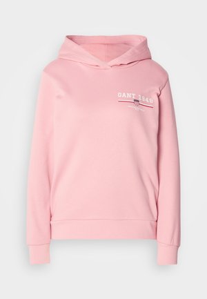 Felpa rosa chiaro realizzata in tessuto morbido, con un logo frontale "GANT 1949" in accenti rossi e bianchi, e una tasca a marsupio.