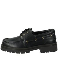 Black leather boat shoe with rounded toe, lace-up front, gold eyelets, and textured rubber sole. Features stitched detailing and a smooth finish.