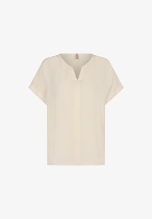 Heledbež värvi lühikeste varrukatega pluus, millel on V-kaelus, mugav lõige ja peen esiseam detail. Valmistatud siledast, kergekaalulisest kangast.