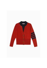 Red cardigan with a black collar, featuring five brown buttons and a left sleeve with navy stripes. Knitted texture with a fitted design.