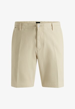 Shorts beige realizzati in tessuto smerigliato con parte frontale piatta, zip e chiusura con bottone. Presentano tasche laterali e un design a gamba dritta.