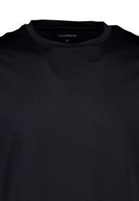 Svart crewneck t-shirt, korta ärmar, tillverkad av slätt tyg, med minimalisk design och varumärkesetikett på halsringningen. Storlek M.