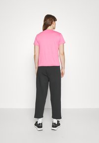 adidas Sportswear ESSENTIALS 3-STRIPES OPEN HEM FLEECE - Pantaloni de trening - black/white