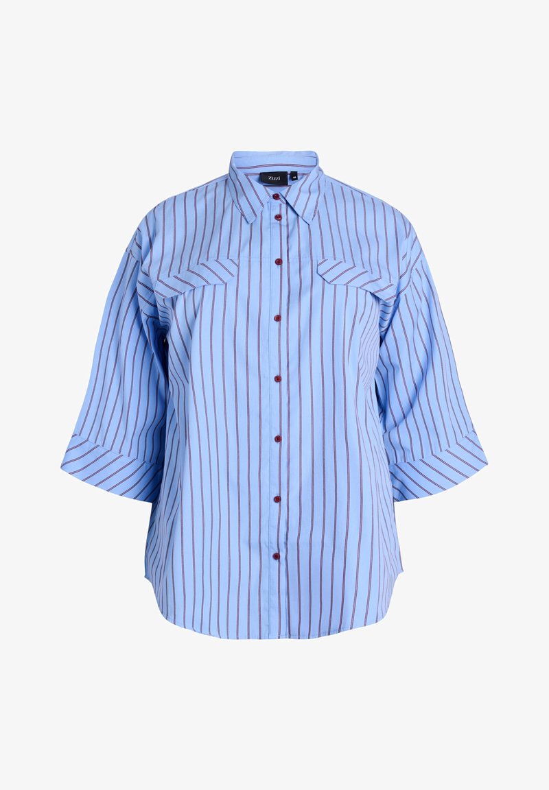 Lyseblå skjorte med røde lodrette striber, brystlommer og brede ærmer. Fremstillet af blødt stof. Har røde knapper.