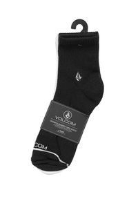 Calcetines hasta el tobillo de color negro con detalles en gris y blanco, que presentan un logo de Volcom, tejido suave y una etiqueta de venta adjunta.