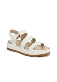 Sandali platform bianchi con tre fasce ampie, un accento con fibbia e una suola testurizzata. Intersuola beige con una finitura liscia.