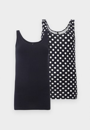 Zwei ärmellose Tanktops, eines in einfarbigem Schwarz und eines in Schwarz mit weißen Punkten, auf weißem Hintergrund präsentiert.